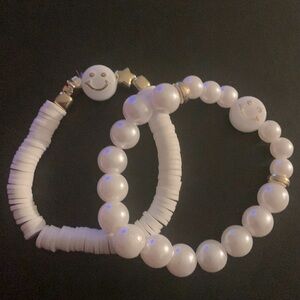 White and gold smiley face bracelets